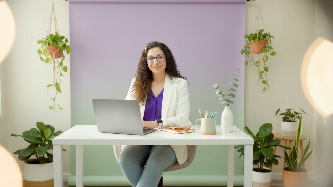 Dr. Raychel Powers at her desk